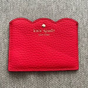 Apple red Kate Spade card case, NWOT and comes from a smoke free home.